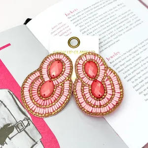 Dazzling Oval Earrings Outlined in Gold Tone Crystals with Beads in Light Pink