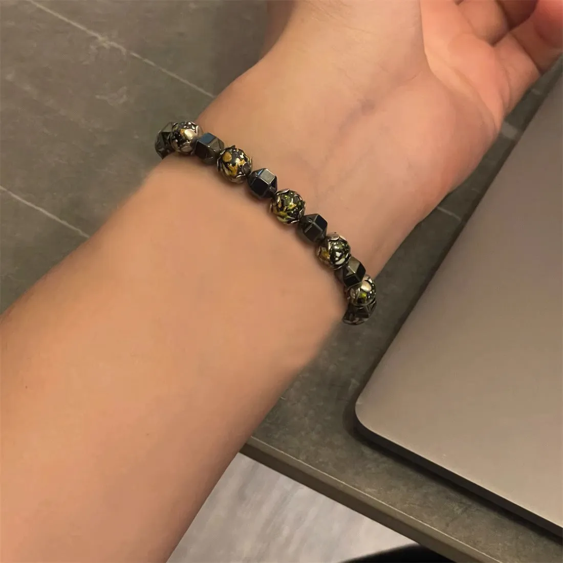 Irregular black gallstone stitching bracelet